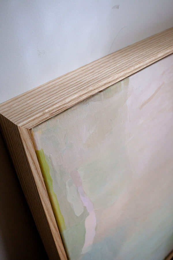 Close up detail of soft greens and pinks of modern Australian abstract artwork
